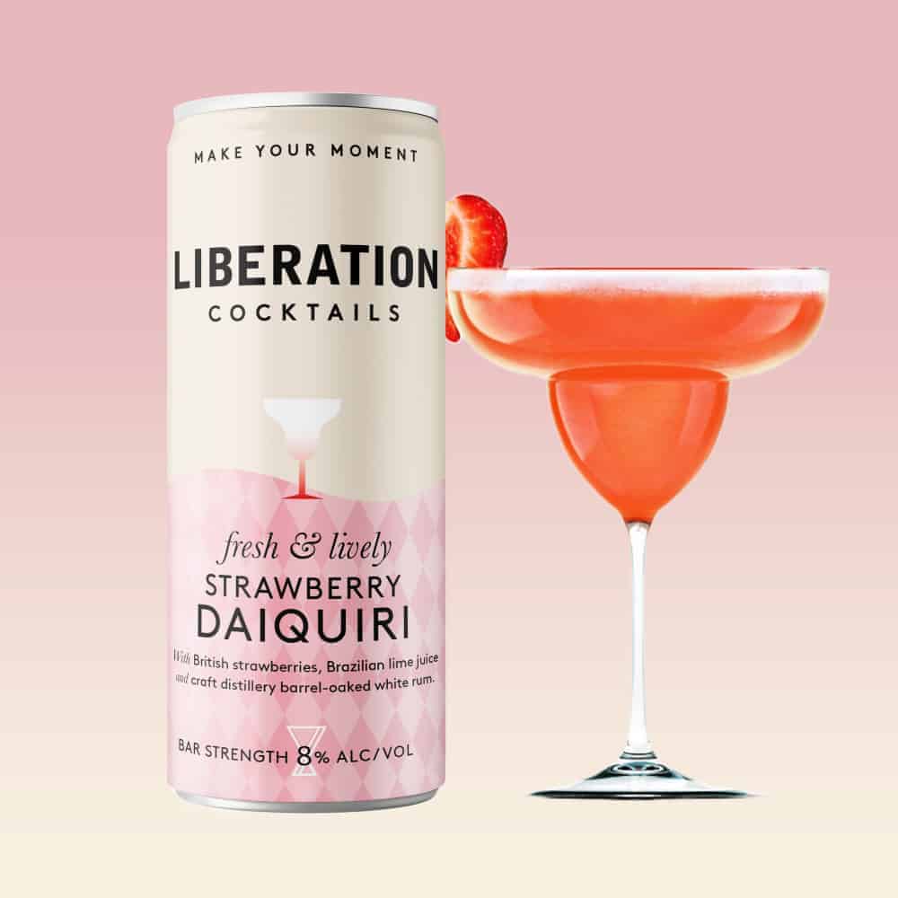 A can of Import placeholder for 19932 and a glass of pink liquid.