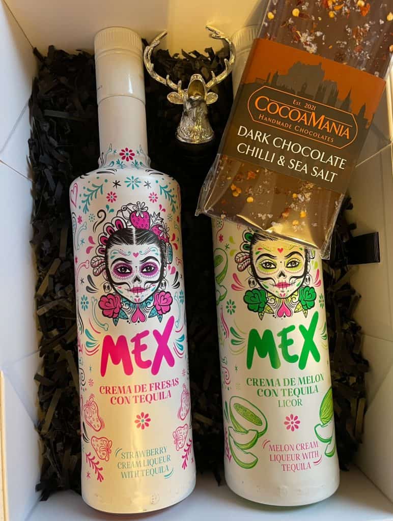 A Customised Gift Box featuring two bottles of Mexican tequila and chocolate.