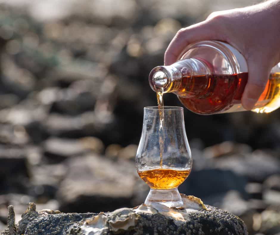 whisky pouring into glass